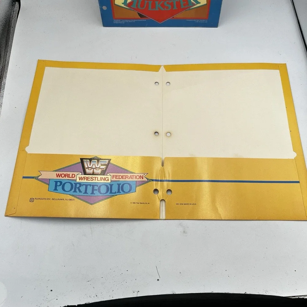 Pair of Hulk Hogan WWF School Folders Yellow and Blue Good Condition